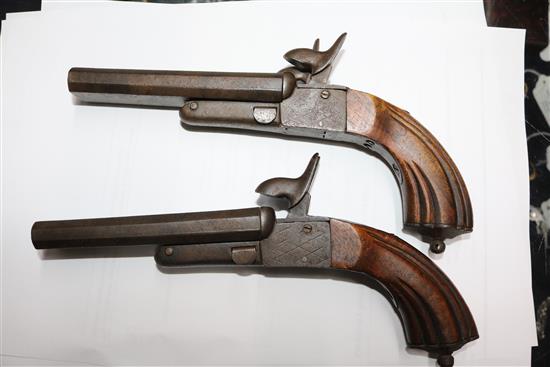 An Edwards flintlock pistol and two replicas